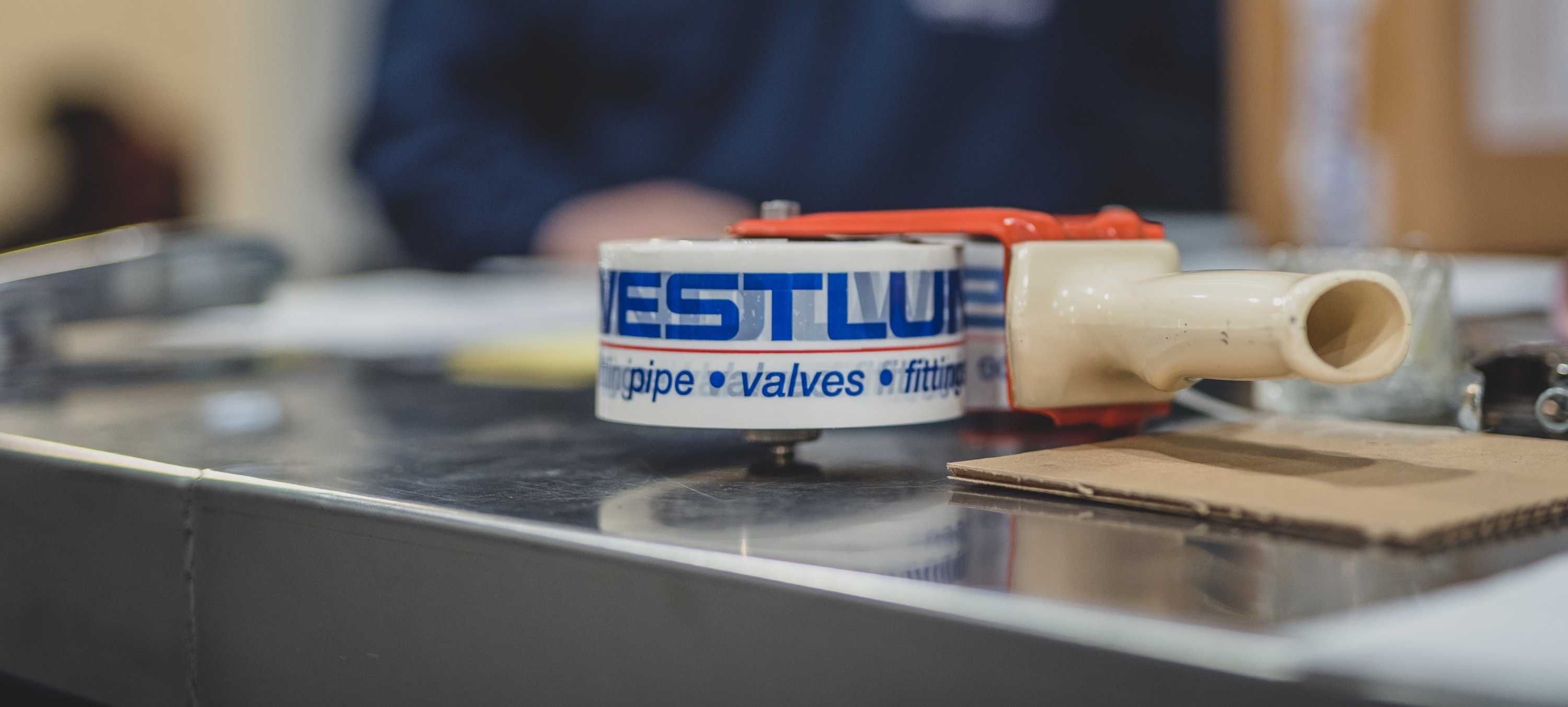 A picture of some packing tape with Westlund's logo on it.